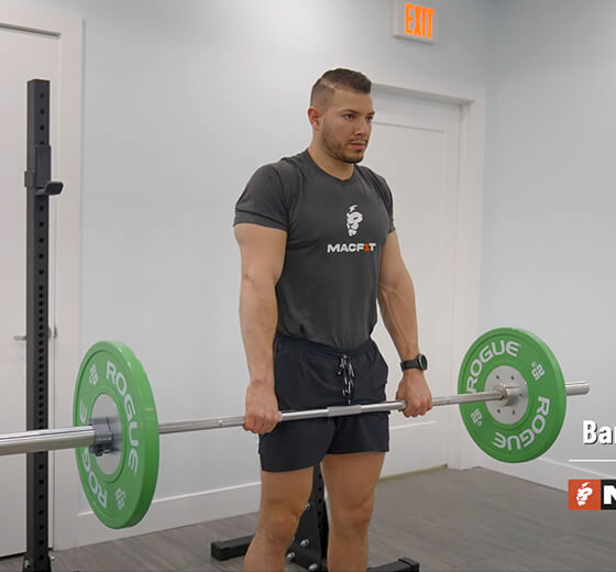 MACF1T coach performing barbell shrugs